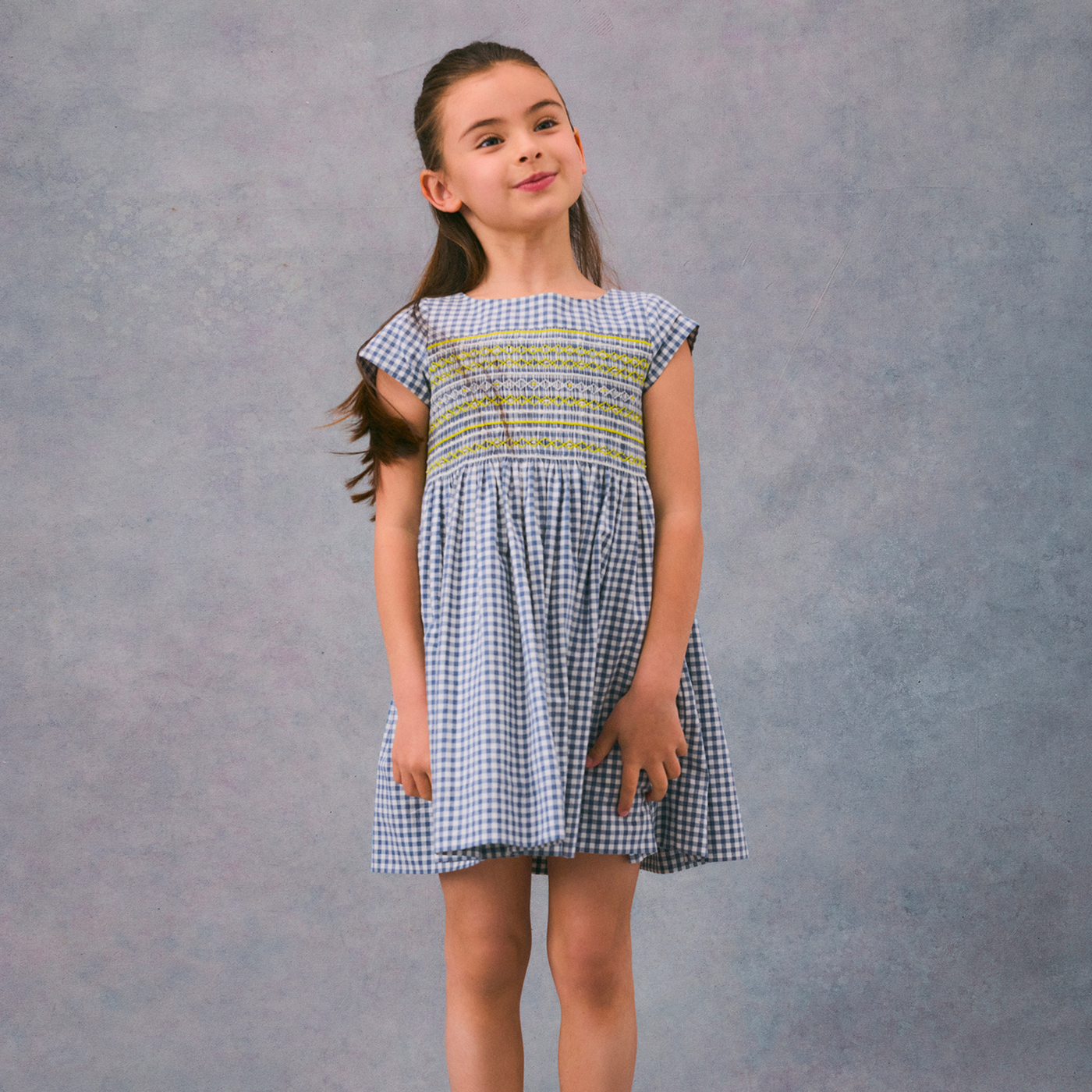 Winter 2024 girl's look smocked dress