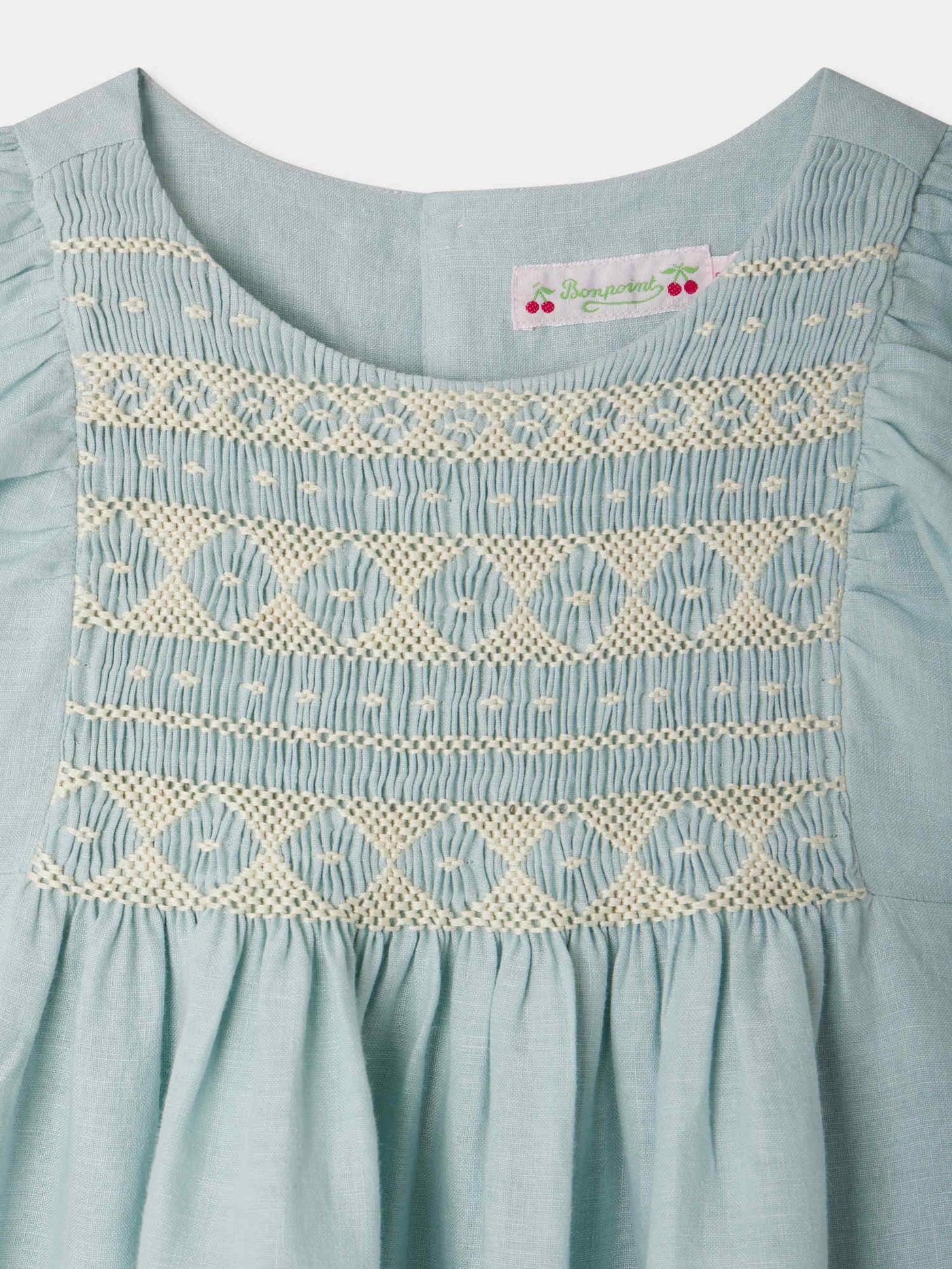 Emeraude smocked and embroidered linen dress