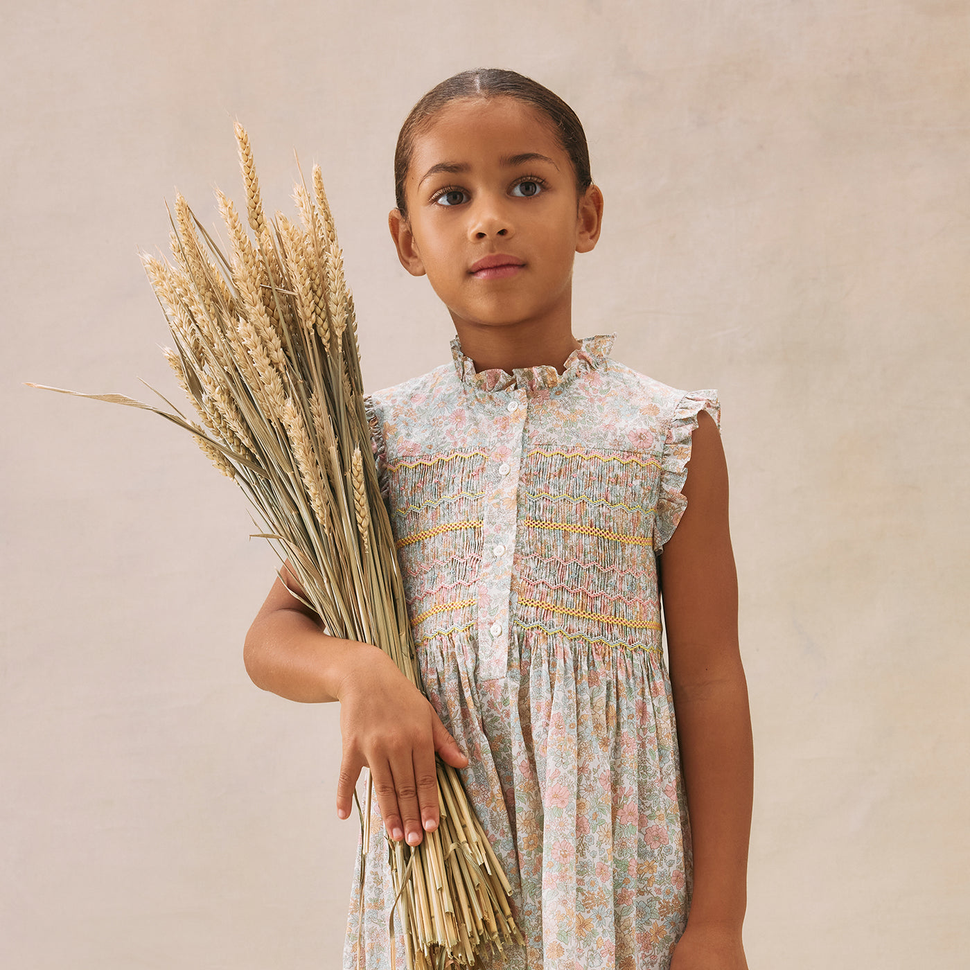 Robe Fabiola smockée et brodée en tissu Liberty