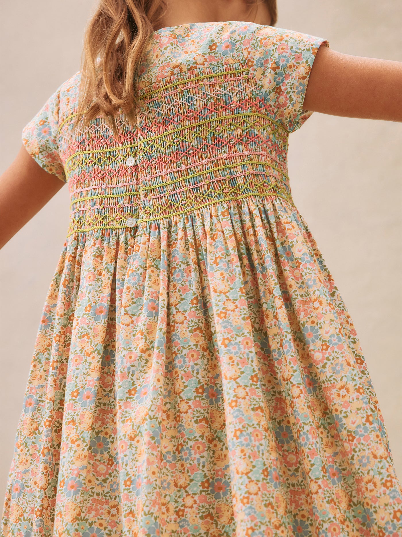 Duchesse smocked dress made with multicolor Liberty fabrics