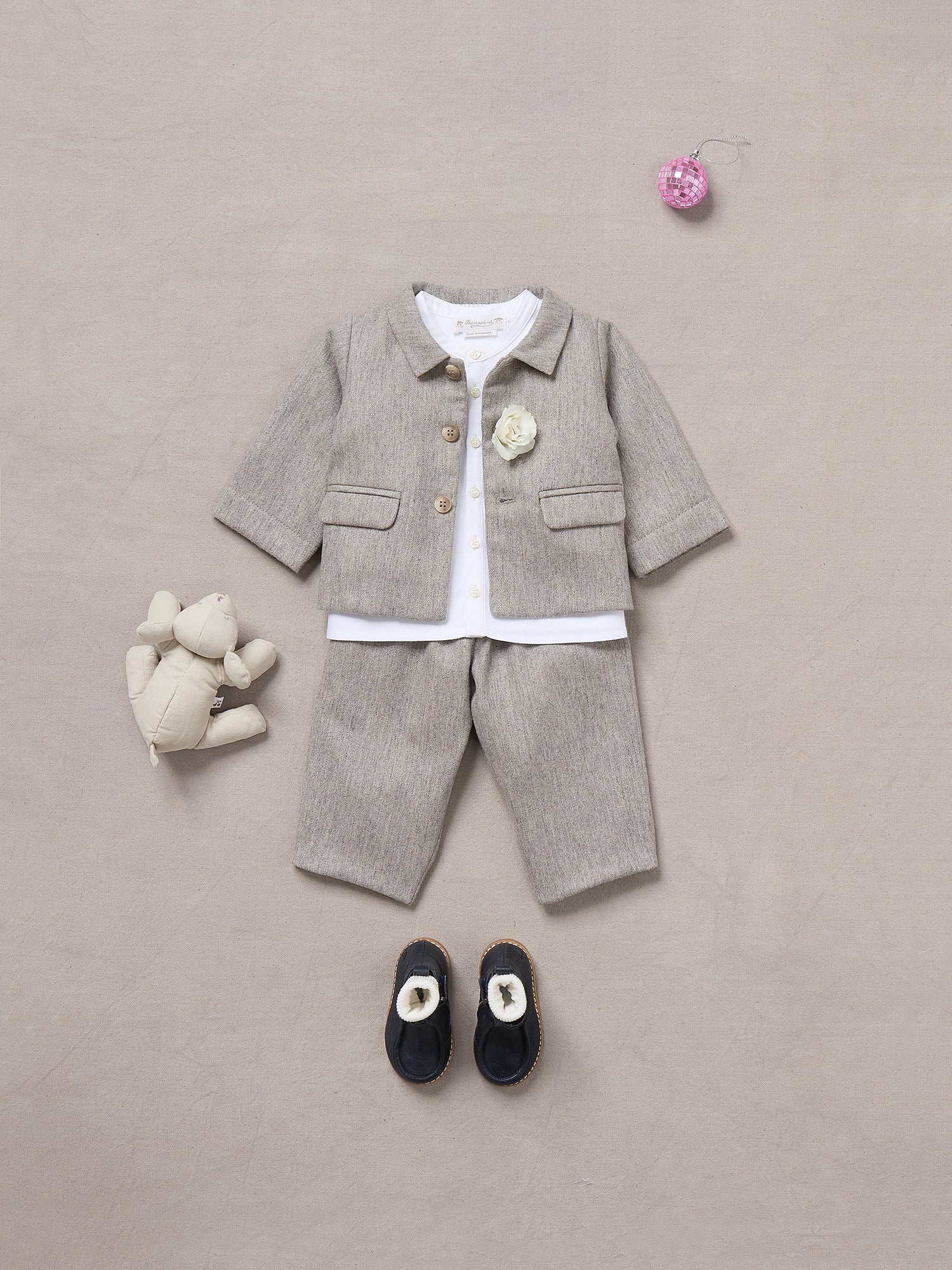 Baby boy orders outfits for special occasion