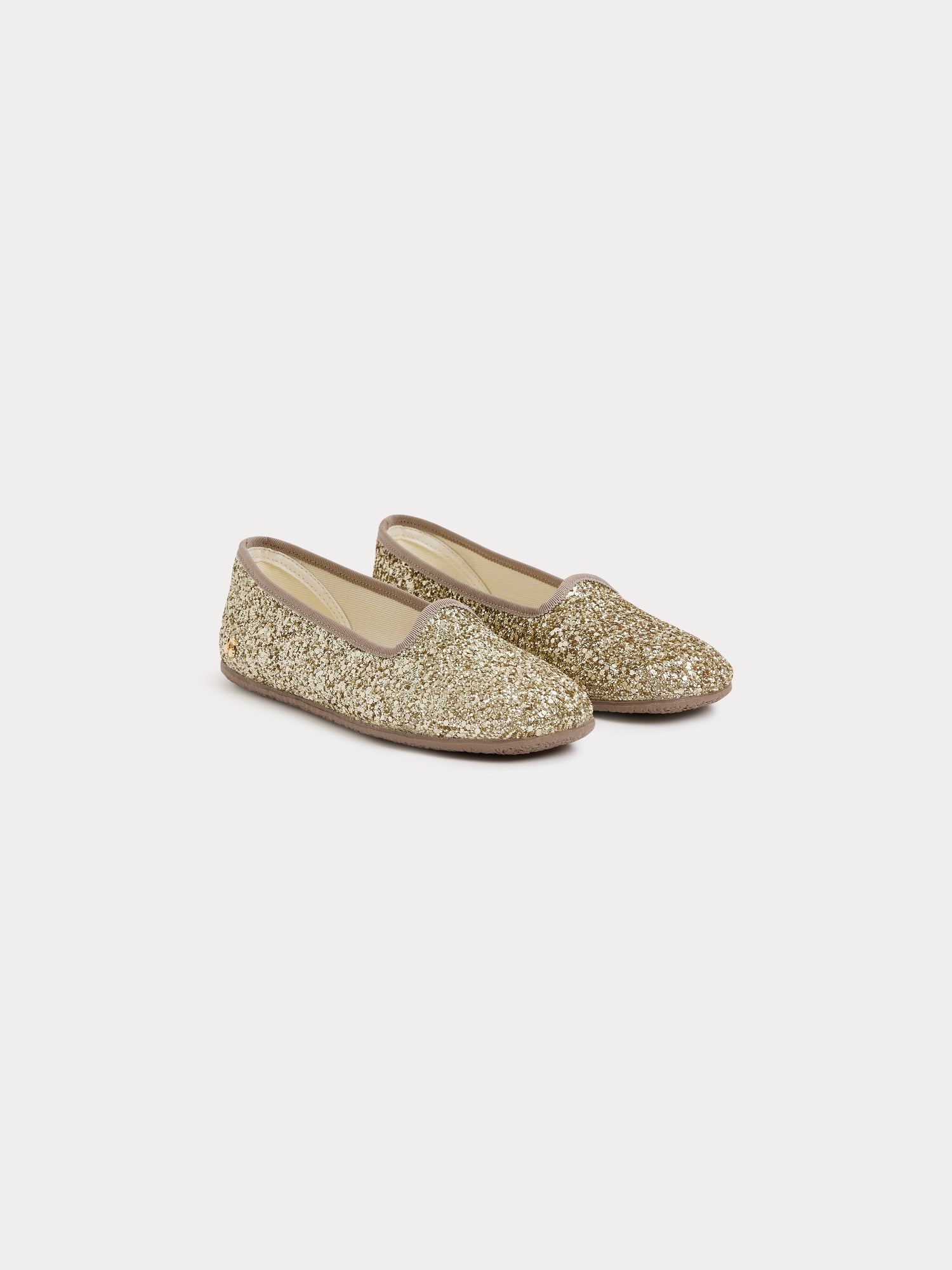 Gold slip on store pumps